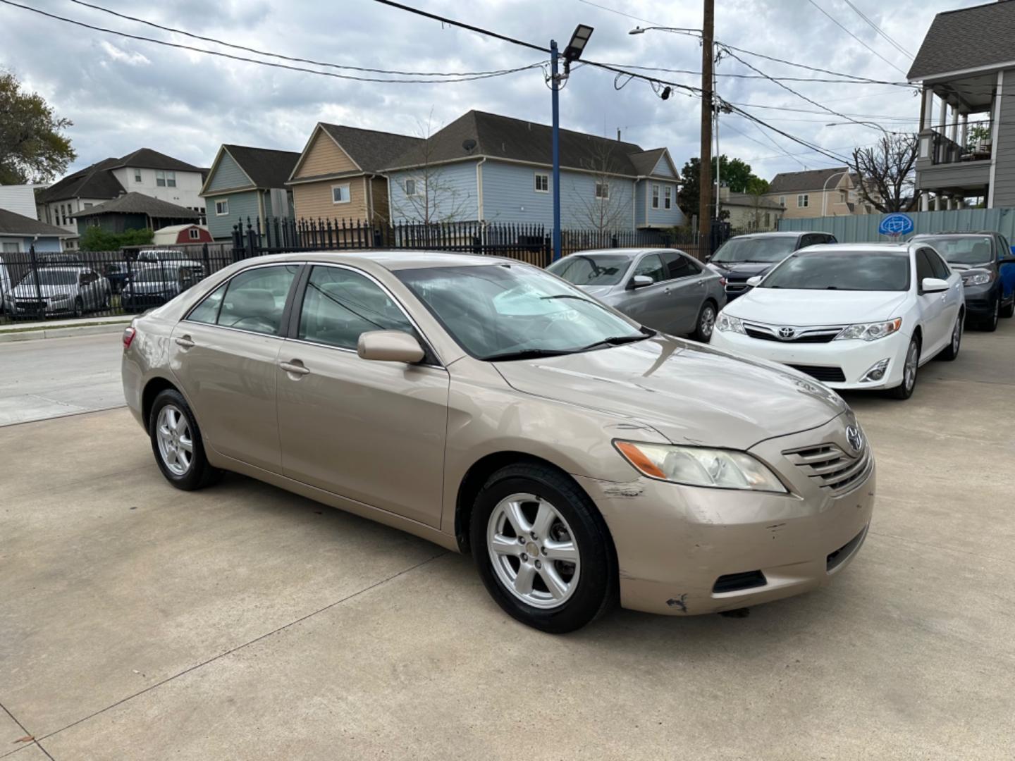 2007 Beige /Beige Toyota Camry LE (4T1BE46K47U) with an 2.4 engine, Automatic transmission, located at 1501 West 15th St., Houston, 77008, (713) 869-2925, 29.797941, -95.411789 - Photo#1